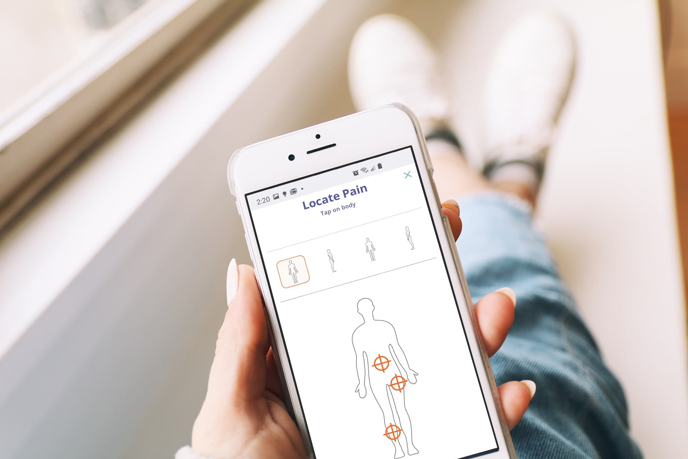 LOCATE PAIN_cell phone in hand