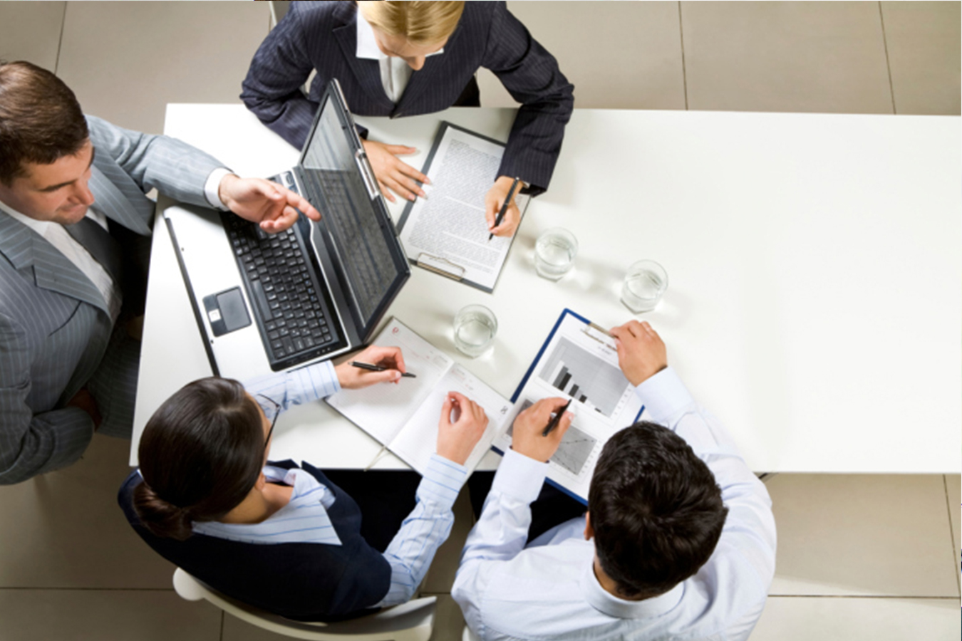 Overhead image of business meeting at table